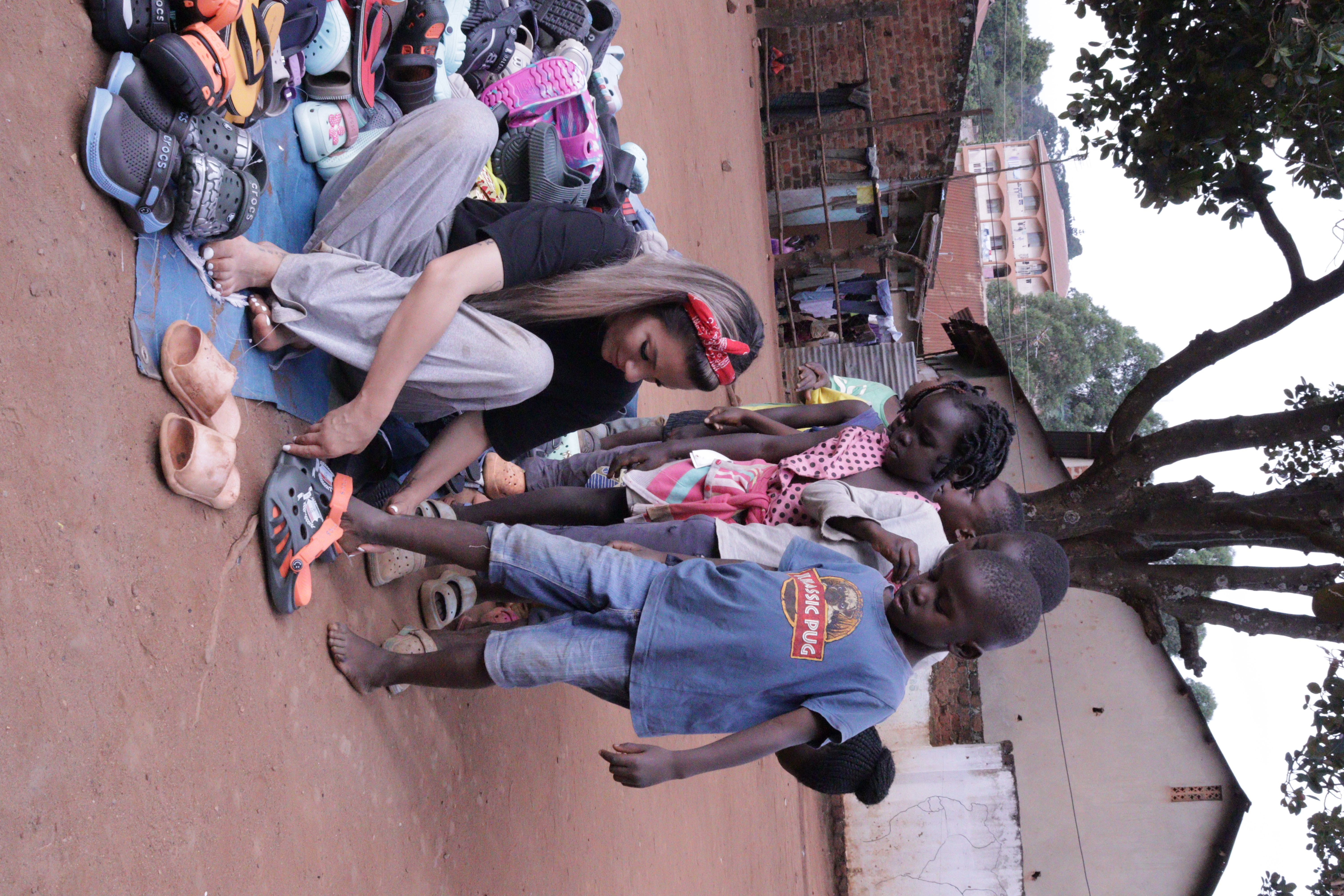 Volunteers assisting children